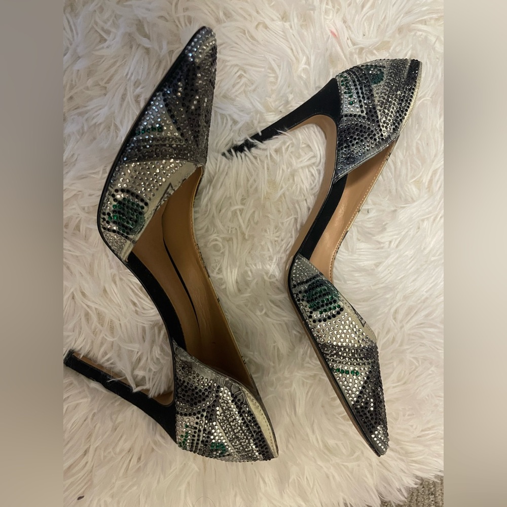 Money stilettos.